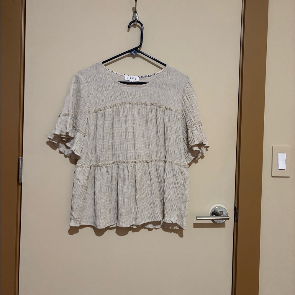 Ruffled seersucker peasant top